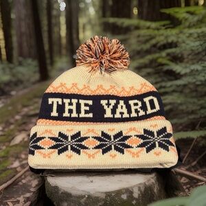 The Yard Downtown McKinney TX Winter Hat Pom Cuffed Knot Snowflake Beanie